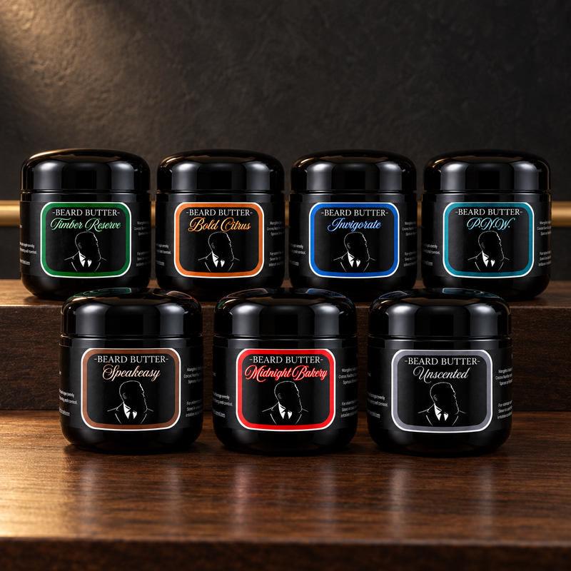 Beard Butters collection by Distinguished Beard Co. on a dark walnut barbershop counter, featuring Timber Reserve, Bold Citrus, Invigorate, P.N.W., Speakeasy, Midnight Bakery, and Unscented.