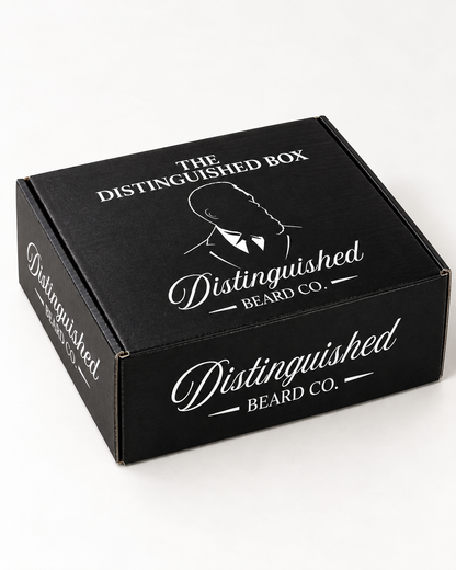 Distinguished Beard Co. black Distinguished Box with white branding, photographed at a three-quarter angle