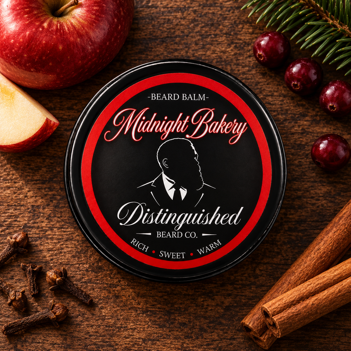 Distinguished Beard Co. Midnight Bakery Beard Balm, styled product on dark wood with apple-and-baking-spice inspired accents