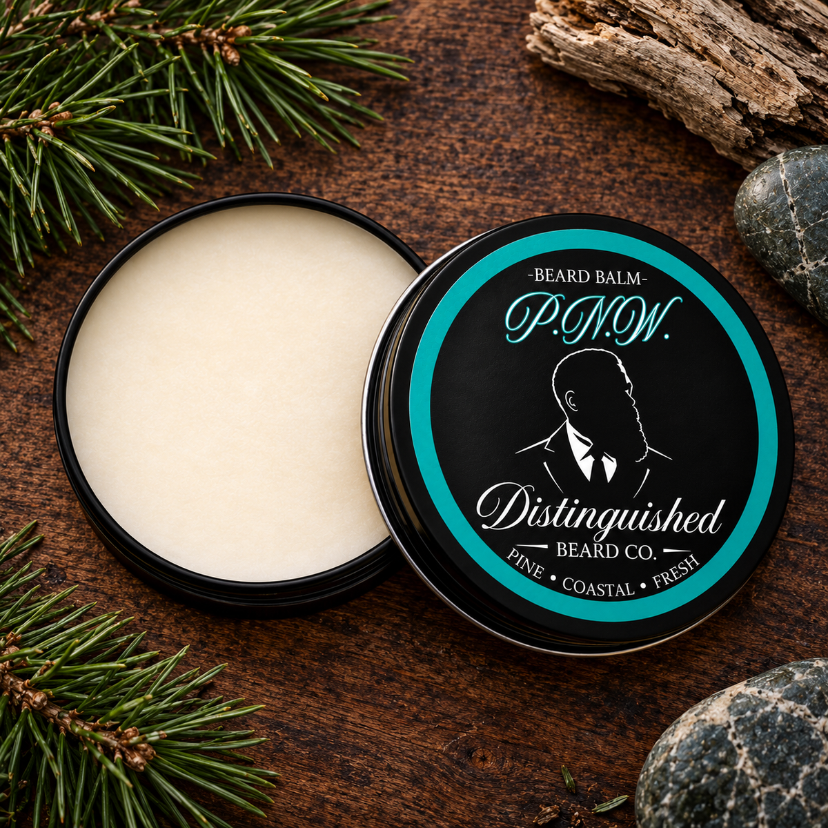 Distinguished Beard Co. P.N.W. Beard Balm, open container on dark wood with pine-and-coastal inspired accents