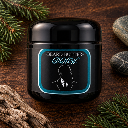 Distinguished Beard Co. P.N.W. Beard Butter, styled product on dark wood with pine-and-coastal inspired accents